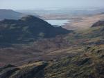 Zoom in on Green Crag with Devoke Water in the distance.