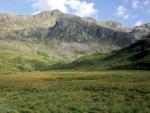 Cam Spout Crag rising diagonally leftward.